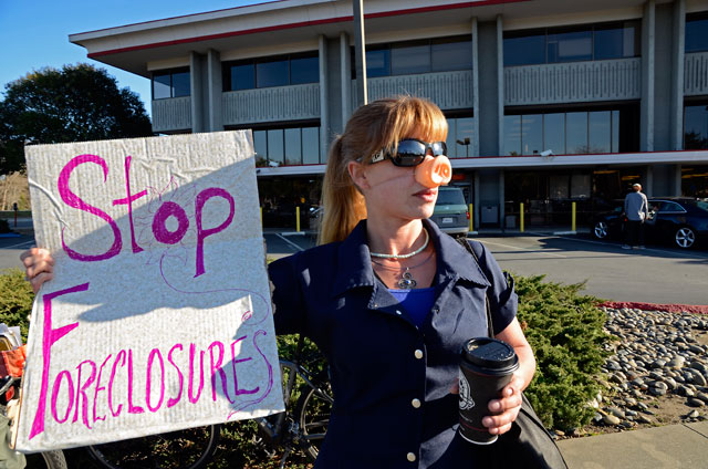 stop-foreclosures-cop-wells-fargo-demonstration-february-15-2012.jpg 